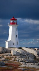 White lighthouse with red top on rocky shoreline under dramatic cloudy sky