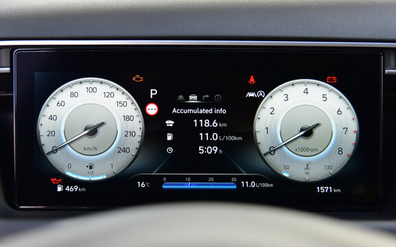 Digital instrument panel in a modern car - Powered by Adobe