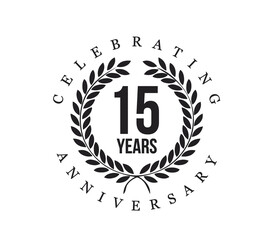 A 15th anniversary celebration emblem with laurel wreath design. Elegant black typography highlights the milestone. Perfect for corporate or personal anniversaries.