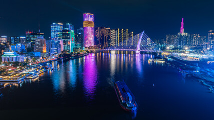 Naklejka premium Colorful Saigon City at night