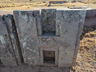 Fotobehang Poema H-Shaped Mysterious Stone at Puma Punku Bolivia  © Kacperito
