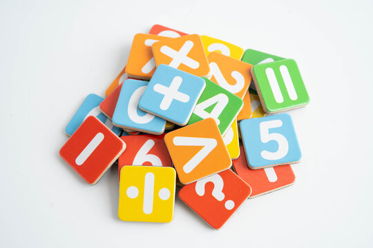 Number wood block cubes for learning Mathematic, education math concept.