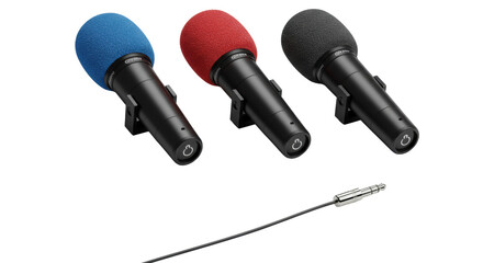 Professional black dynamic microphones with colorful windscreens, silver audio jack, arranged on light grey, shadowless background. Concept of professional audio equipment display