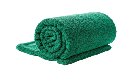 Green rolled blanket soft and cozy for warmth and comfort.