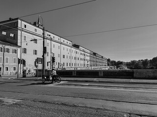 Rome, Italy - June 20, 2025, view of the large complex The complex of S. Michele a Ripa which runs along the entire front of the Porto di Ripa Grande on the Tiber River, seen from the Ponte Sublicio.