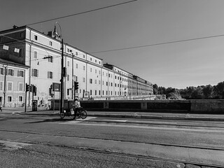 Rome, Italy - June 20, 2025, view of the large complex The complex of S. Michele a Ripa which runs along the entire front of the Porto di Ripa Grande on the Tiber River, seen from the Ponte Sublicio.