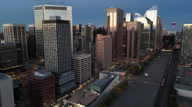 Aerial view of skyscrapers at night in Calgary, Alberta's booming downtown core. 