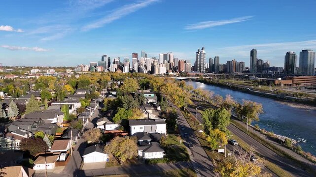Aerial view of Calgary's downtown from along the Bow River on the west side of downtown looking east close to Memorial Drive. 
