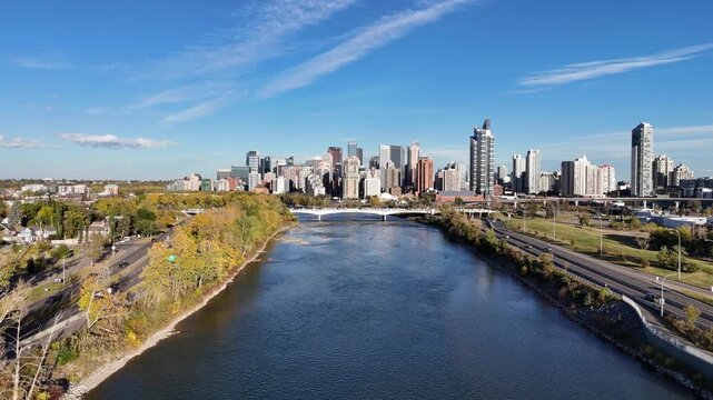 Aerial view of Calgary's downtown from along the Bow River on the west side of downtown looking east close to Memorial Drive. 