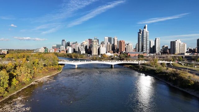 Aerial view of Calgary's downtown from along the Bow River on the west side of downtown looking east close to Memorial Drive. 