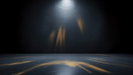 Obraz premium Dark studio with textured wall and floor illuminated by golden light beams image