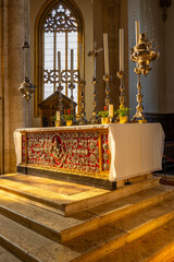 Ornate church altar displaying religious artifacts in Pienza
