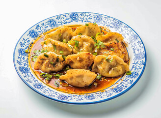 Sichuan Spicy Wontons in Hot Chili Oil with Scallions in plate side view of japanese food