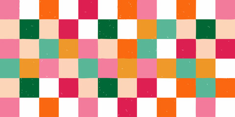 Colorful painted squares create a checkered pattern