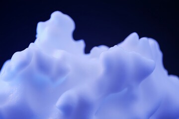 Ethereal cloud formation illuminated with soft blue and white light abstract background