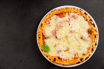 Pizza ham, cheese, tomato sauce fast food natural product tasty snack fresh delicious gourmet food background on the table rustic top view copy space