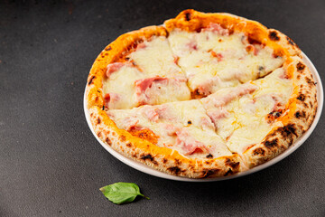 Pizza ham, cheese, tomato sauce fast food natural product tasty snack fresh delicious gourmet food background on the table rustic top view copy space