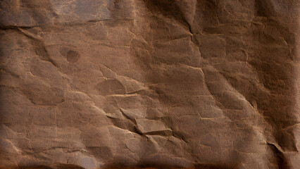 Dark brown vintage paper, old paper texture background. Collage crumpled paper, fade texture, brown background, old collage background. Vintage brown crumpled paper texture.