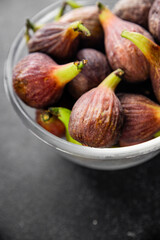 Figs fresh ripe fruit natural product tasty snack fresh delicious gourmet food background on the table rustic top view copy space diet vegan and vegan food