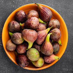 Figs fresh ripe fruit natural product tasty snack fresh delicious gourmet food background on the table rustic top view copy space diet vegan and vegan food