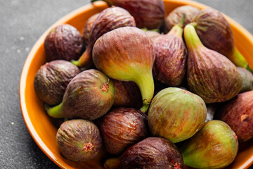 Figs fresh ripe fruit natural product tasty snack fresh delicious gourmet food background on the table rustic top view copy space diet vegan and vegan food