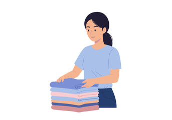 Woman folds laundry stacking folded clothes in a pile