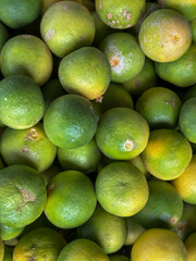 Fresh Limes Displayed at Traditional Market