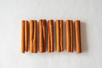 Cinnamon sticks on white background
