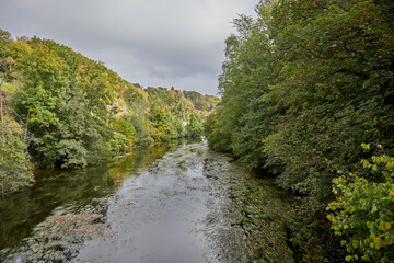 view on Moehne river at late summer time in Ense, Germany