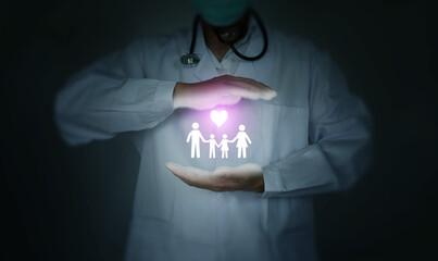 Medical doctor protecting family health with glowing icon and heart symbol, representing healthcare, insurance, safety, and medical support concept for well-being.