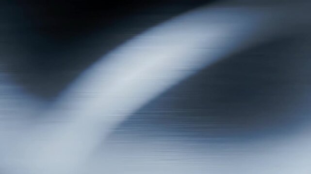 Abstract Motion Blur: Dark Blue and White Streaks with Dynamic Light Transition