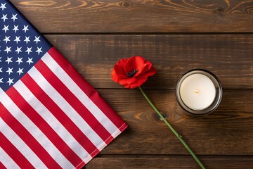 Obraz premium American Flag with Red Poppy Flower and Candle on Rustic Brown Wooden Background