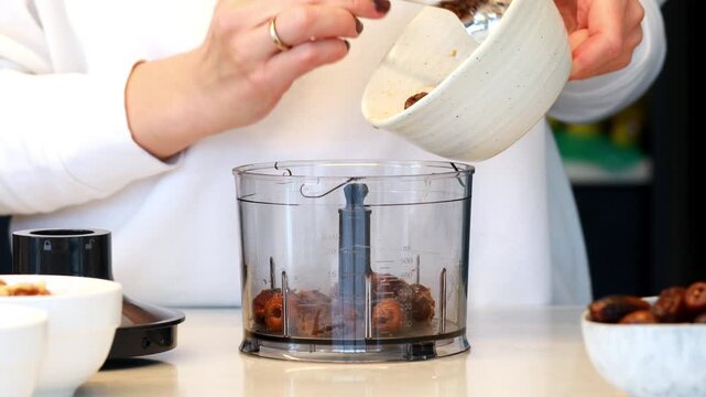 Cooking healthy date candies using a blender in a modern kitchen. Recipe step by step, step 1