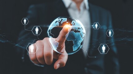 Businessman touching glowing digital globe with network connections