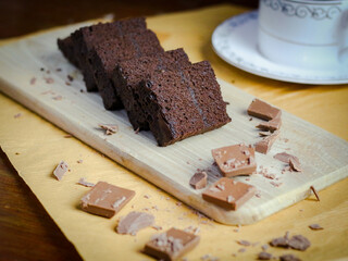 Several slices of chocolate cake with chocolate