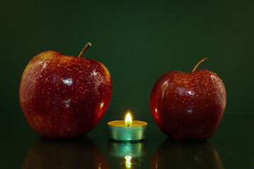 red apple on black background