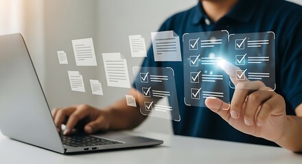 Businessman using laptop and digital document checklist concept on virtual screen