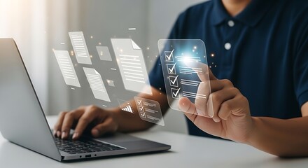 Businessman using laptop to manage electronic documents and online approval