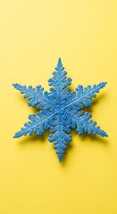 Blue Snowflake on Yellow Background.
