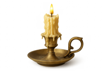 Vintage brass candlestick holding burning wax candle