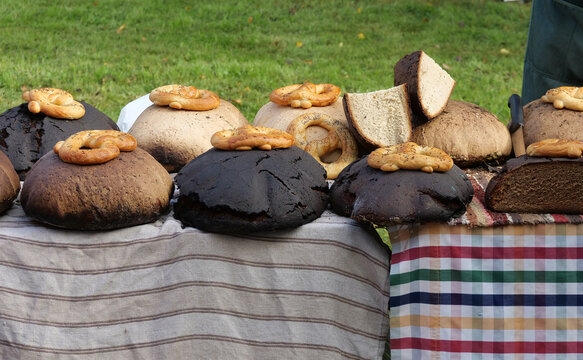 A Stall at a Harvest Festival Selling Traditional Dark Rye Bread