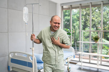 Confident patient stands beside hospital bed, posing in various poses, smiling warmly in gown, showing strength and positivity during recovery in bright and peaceful ward.