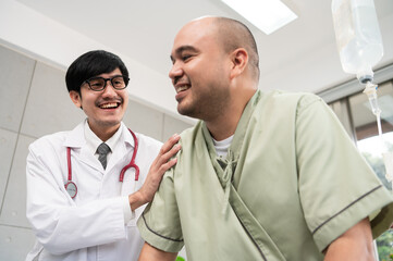 The doctor discusses and encourages the patient about treatment options while assisting them in walking, building trust in a bright and supportive hospital environment.