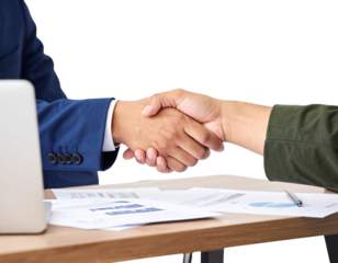 Business Partners Shaking Hands Across Office Desk