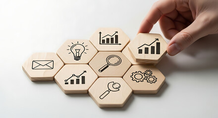 Assembling business strategy with diverse iconic elements on hexagonal tiles