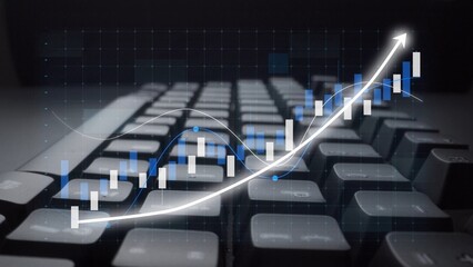 A visually engaging image showcasing financial growth represented by a graph on a keyboard, symbolizing modern technology role in data analysis and business success. Copula