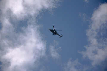military helicopter in flight