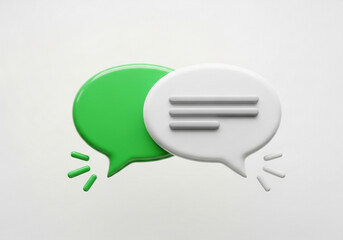 Two chat bubbles, one green and one white, isolated on white background