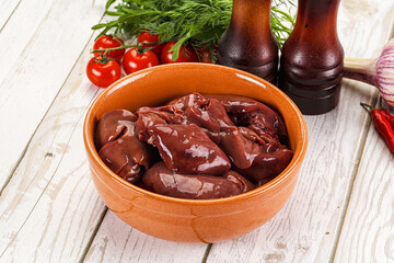 Raw chicken liver uncooked in the bowl