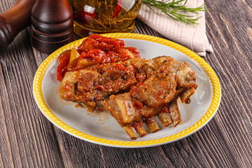 Baked lamb ribs with vegetables